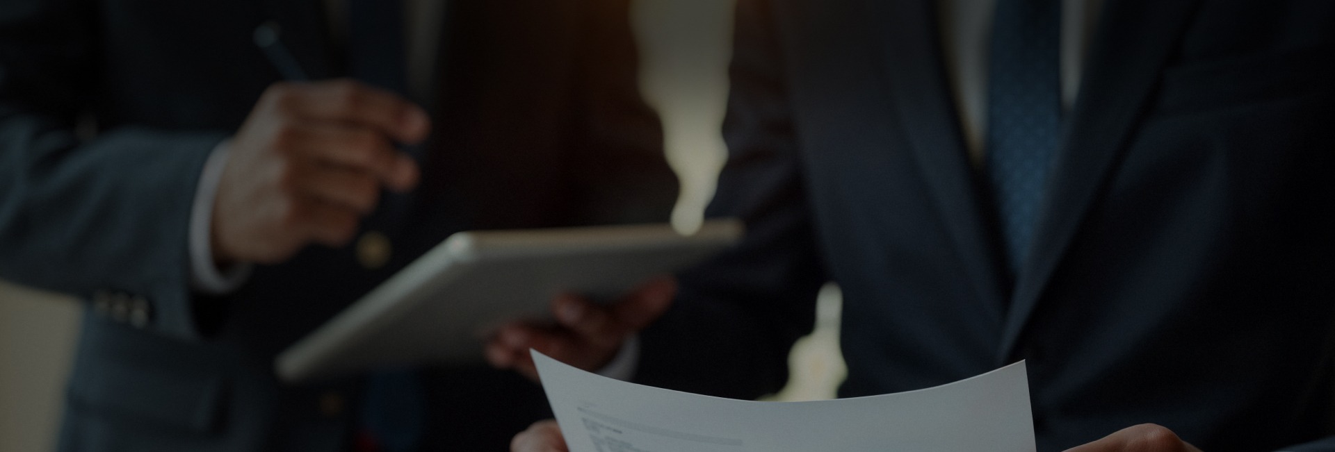 business people reviewing document