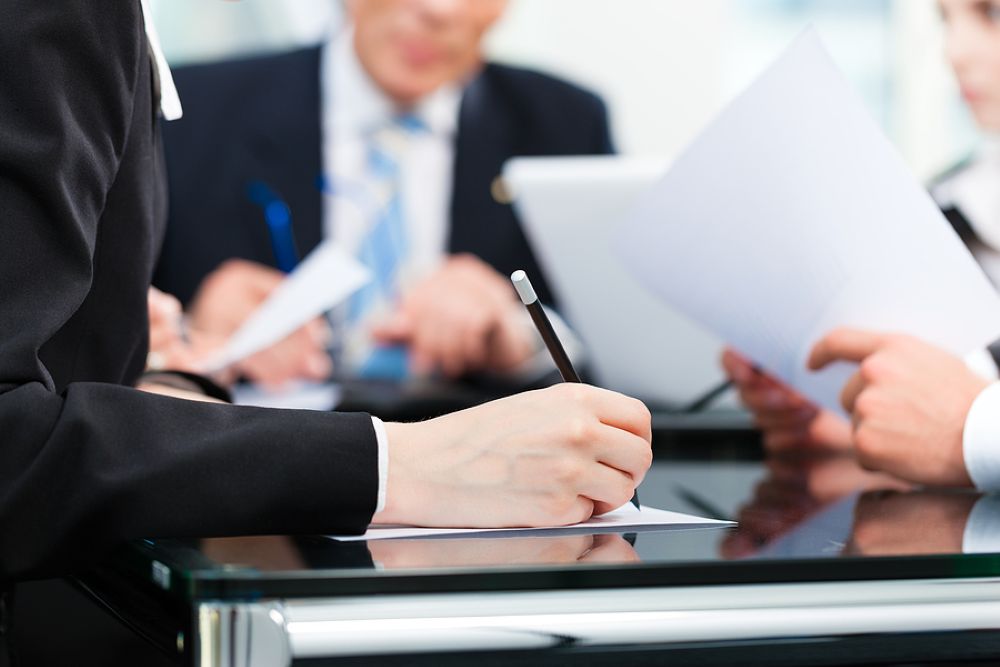 Team of attorneys negotiating lump sum settlement